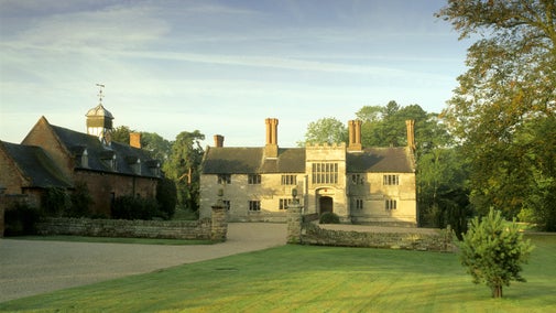 A view of the forecourt at Baddesley Clinton, Warwickshire on a summer's day
